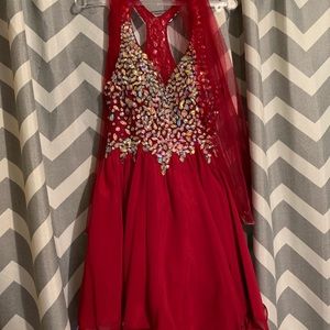 Short red prom dress, sequined bodice.